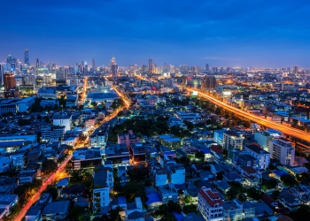Bangkok city aerial view at twilight, business district with high building at dusk.